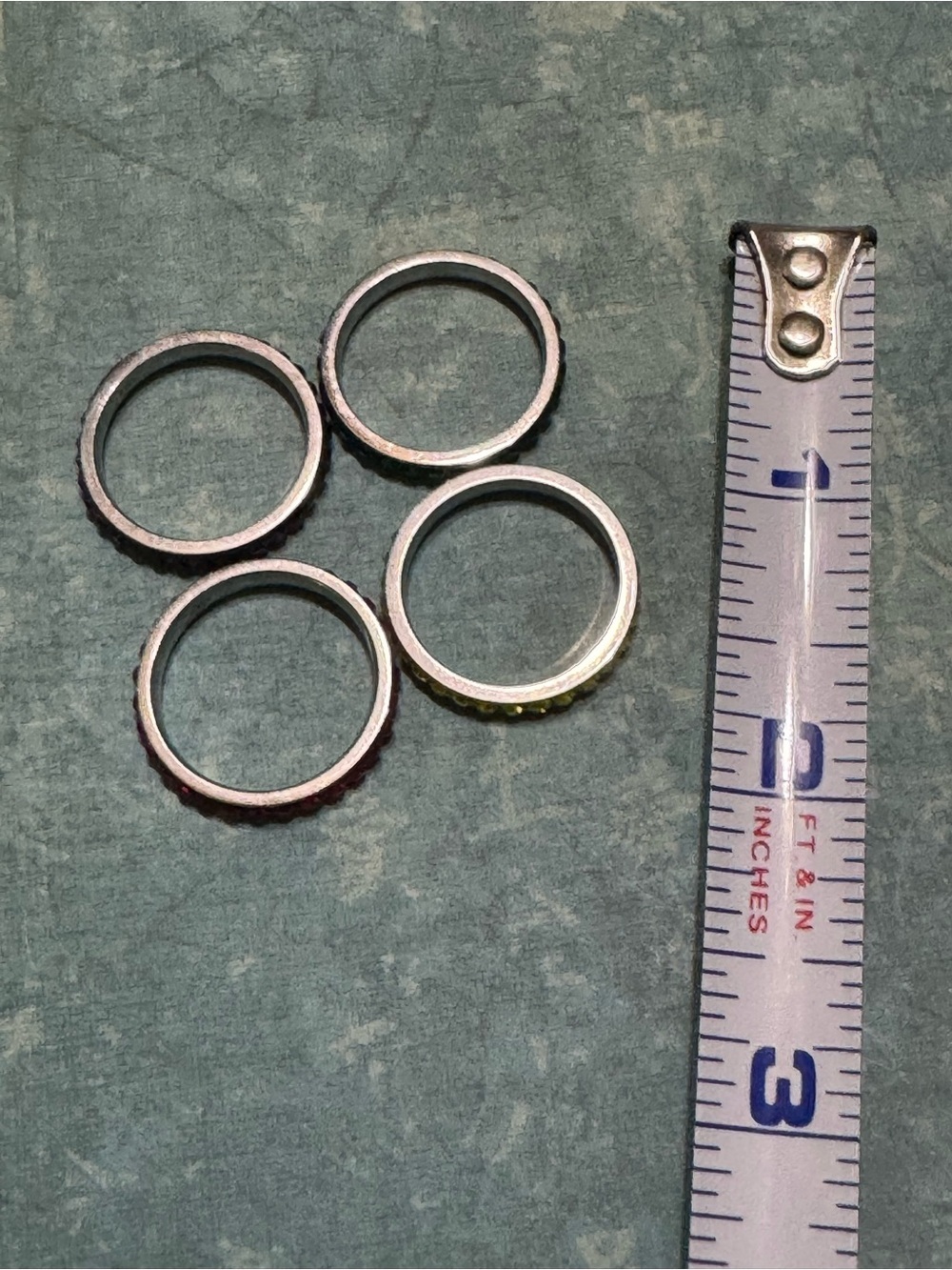 SET OF FOUR STACKABLE STAINLESS STEEL RINGS - Picture 3 of 7